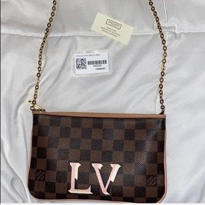 Louis Vuitton Double Zip Pochette